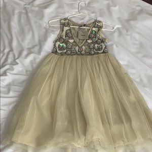 Embellished cream dress